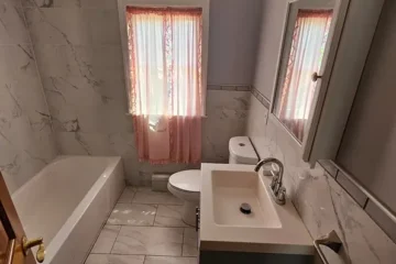 Bathroom with soaking tub at 175 Park Ave, Passaic NJ