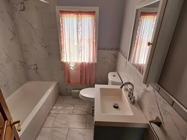 Bathroom with soaking tub at 175 Park Ave, Passaic NJ