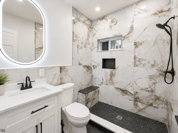 Renovated marble bathroom at 282 Ackerman Ave, Clifton NJ