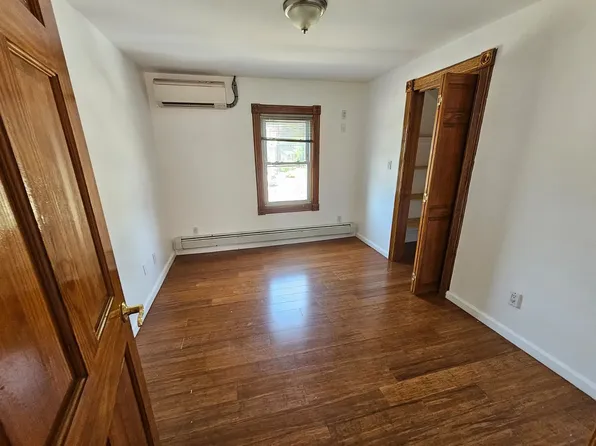 Bedroom with hardwood floors at 175 Park Ave, Passaic NJ