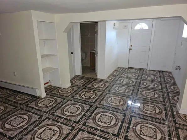 Entryway with decorative tile floor at 175 Park Ave, Passaic NJ