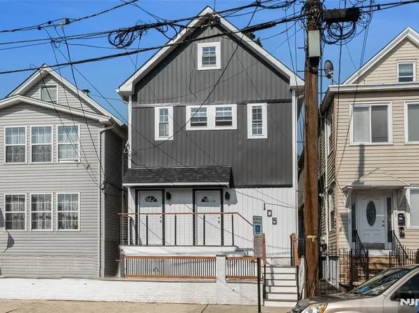 Front exterior of the new-construction two-family home at 105 10th St, Passaic NJ