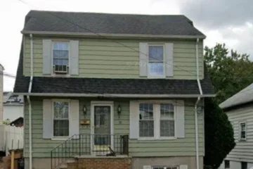 Front exterior of the single-family rental home at 23 Parkview Ter, Clifton NJ
