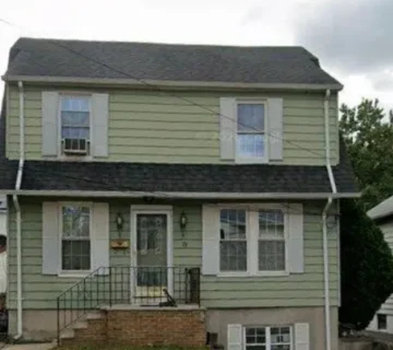 Front exterior of the single-family rental home at 23 Parkview Ter, Clifton NJ