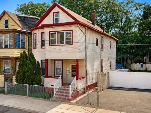 Front exterior of the two-family home at 33 Vreeland Ave, Passaic NJ