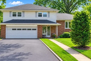 Front exterior of the renovated split-level rental home at 65 Daniels Dr, Clifton NJ