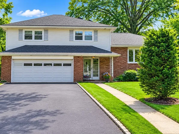 Front exterior of the renovated split-level rental home at 65 Daniels Dr, Clifton NJ