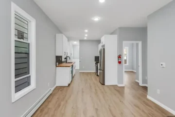 Kitchen with custom butcher-block countertops at 105 10th St, Passaic NJ