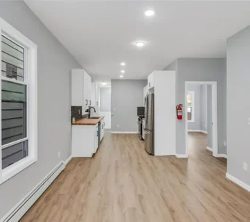 Kitchen with custom butcher-block countertops at 105 10th St, Passaic NJ