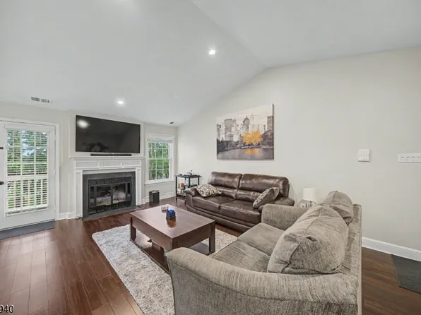 Living room with fireplace at 3 Juniper Ct #125, Clifton NJ