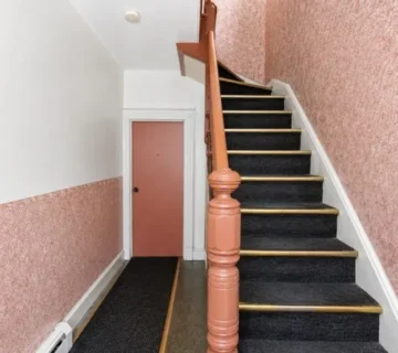 Interior staircase and entryway at 33 Vreeland Ave, Passaic NJ